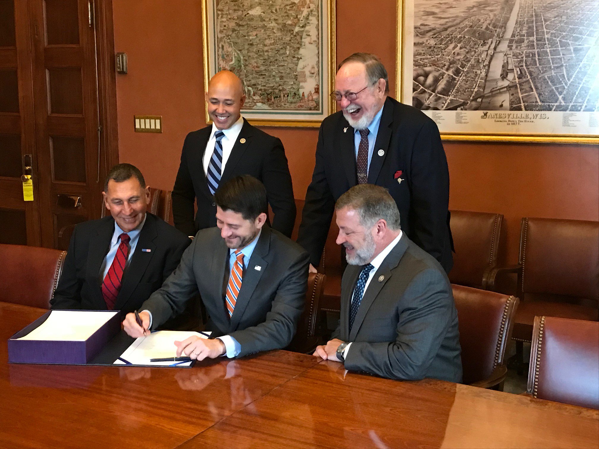 Reps. Brian Mast (FL-18), Don Young (AK-At Large), Frank LoBiondo (NJ-2), Paul Ryan (WI-1) and Bill Shuster (PA-9) meet for the signing of the Frank LoBiondo Coast Guard Authorization Act of 2018, which includes the Jupiter Island Land Transfer Act, on November 30, 2018 in the United States Capitol Building.